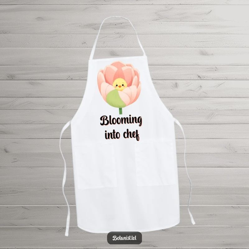 Funny apron featuring a fluffy chick peeking out from a giant, blooming tulip, ready for spring.