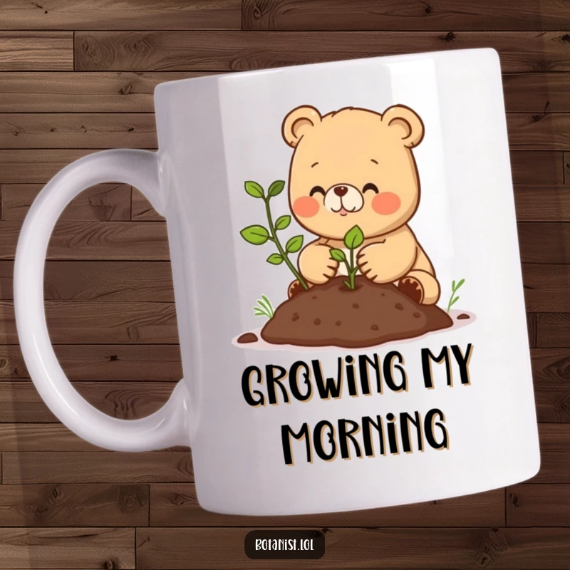 Funny mug with a happy bear cub carefully transplanting a tiny seedling into rich soil, embodying cuteness and gardening passion.
