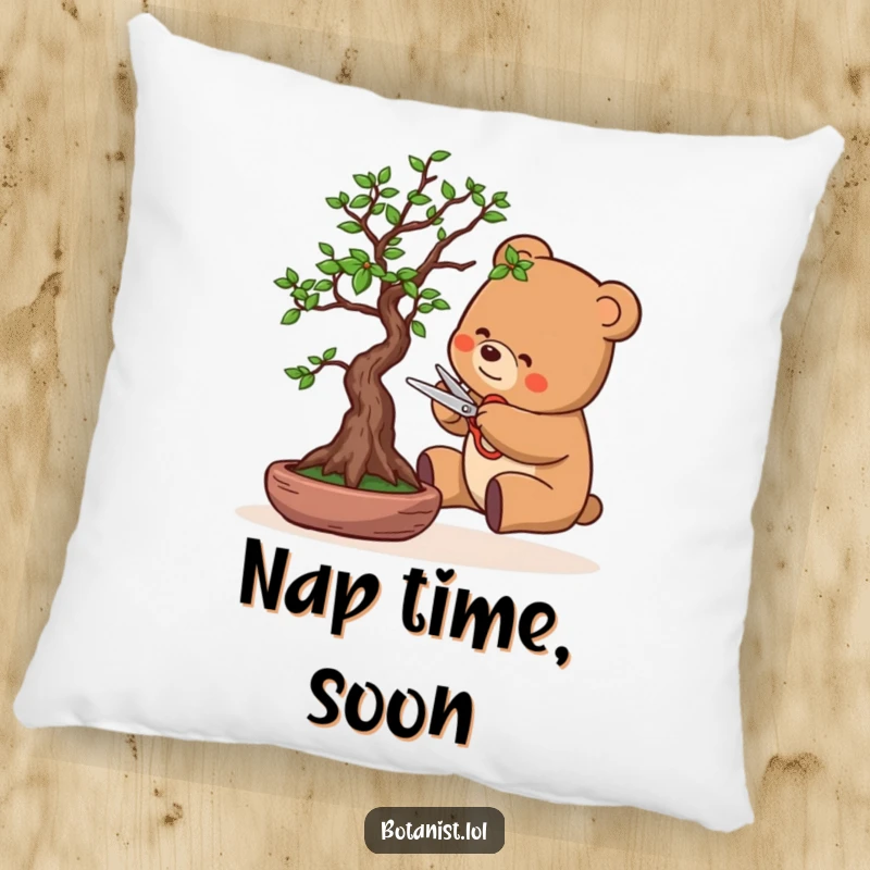 Funny pillow showcasing a bear with tiny scissors, focused on carefully pruning a miniature bonsai tree. A delightful and humorous decor piece.