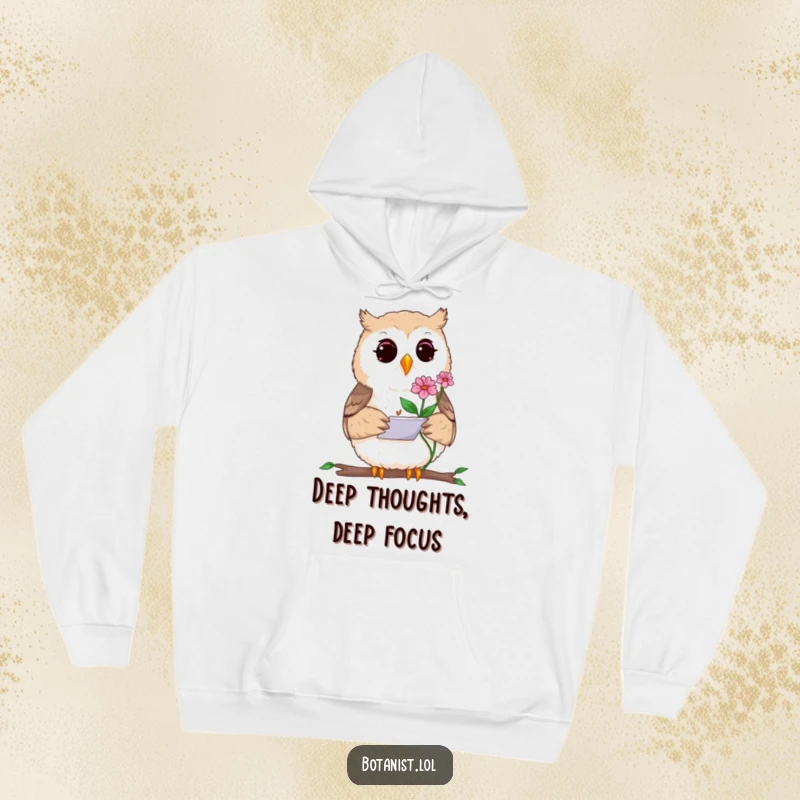 Funny hoodie depicting a focused curious owl artist sketching a delicate rare plant in a small notepad, perfect for artists and nature enthusiasts.