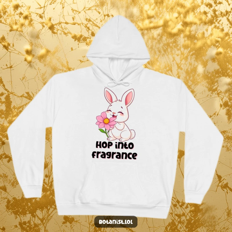 Funny hoodie showing a bunny radiating laughter while smelling an enormous, vivid flower, embodying pure delight.