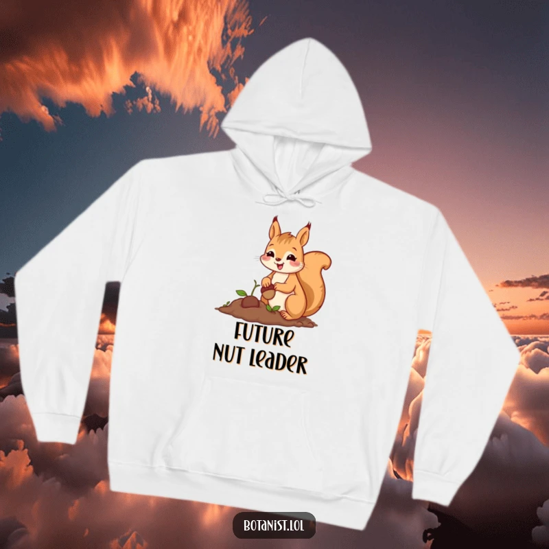 Funny hoodie with a cheerful squirrel character carefully planting a tiny acorn with a proud and happy smile.