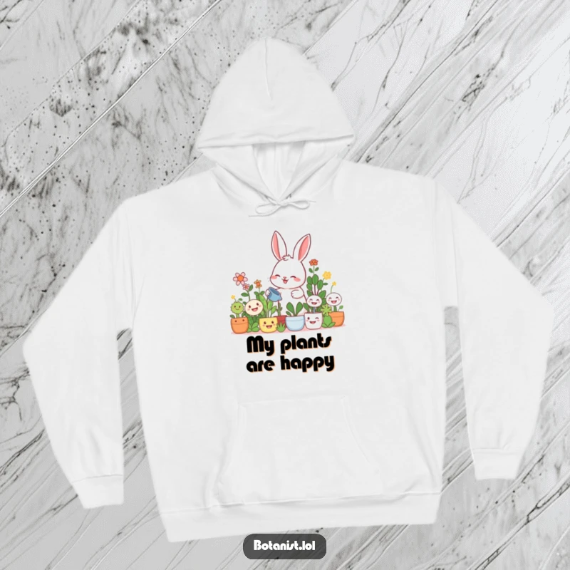 Funny rabbit gardener hoodie, a giggling rabbit watering oversized smiling plants, providing cozy comfort and garden cheer.