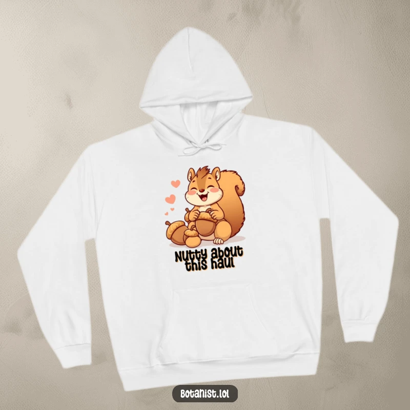 Funny giggling squirrel hoodie, joyfully gathering oversized acorns, offering warmth and humorous delight.