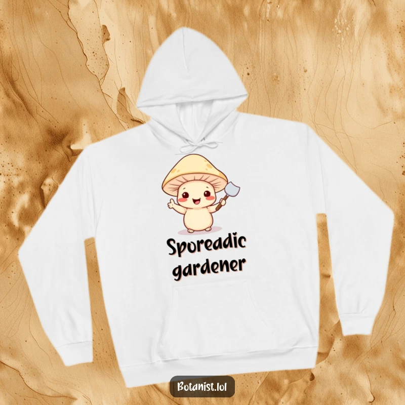 Funny hoodie featuring a cheerful mushroom wearing a hat and holding a tiny trowel, ready for some gardening.