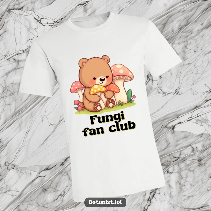 Funny bear cub mushroom t-shirt, featuring a content cub tending vibrant oversized mushrooms, perfect for nature lovers.