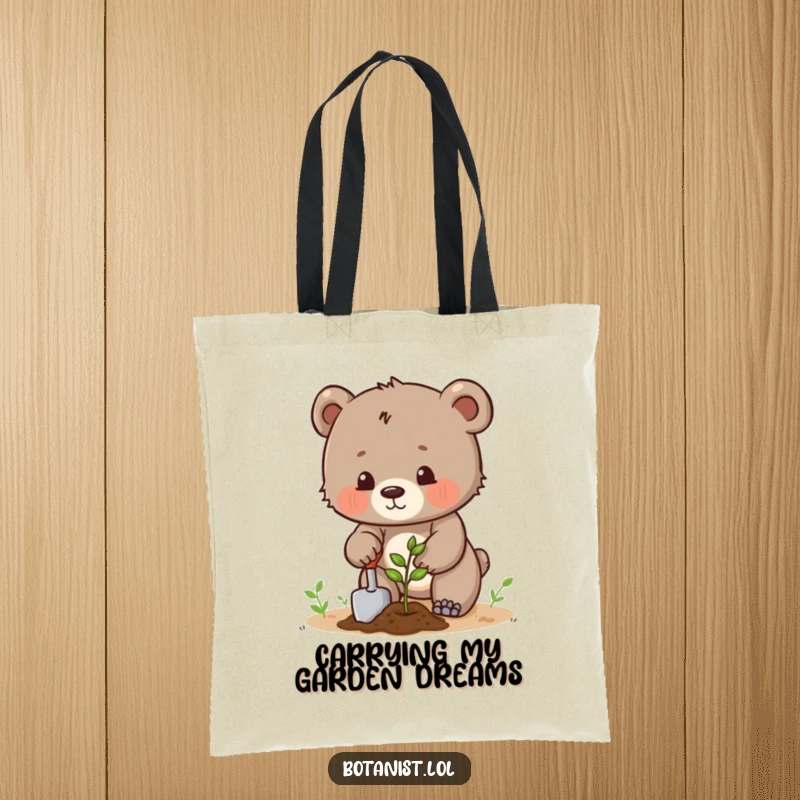 Funny determined bear cub planting a seed with a trowel, a humorous and practical tote bag. Great gift.